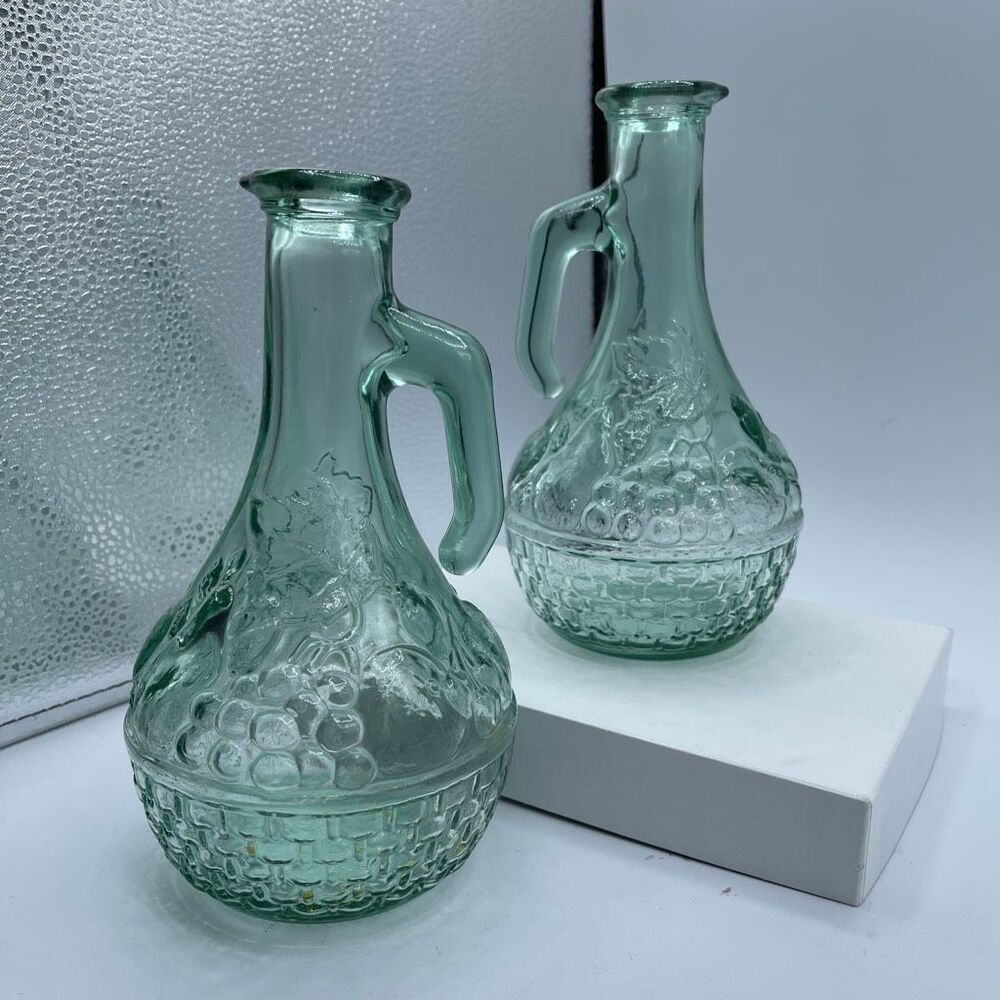 Vintage green cruets decanters embossed basket weave grapes.
